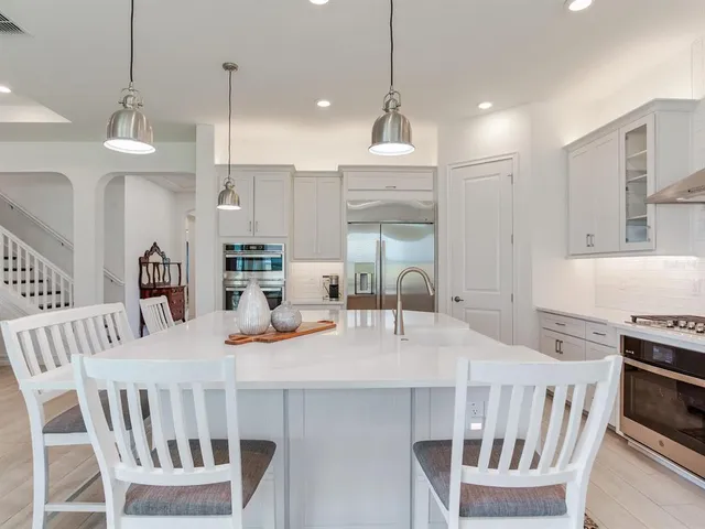 a white bath tub sitting next to a window