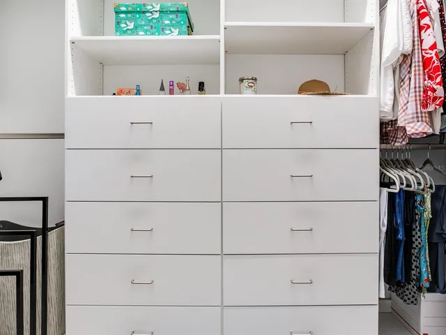 a view of a swimming pool with an outdoor seating