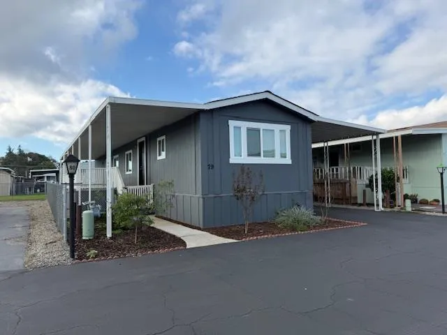 a front view of a house with garage