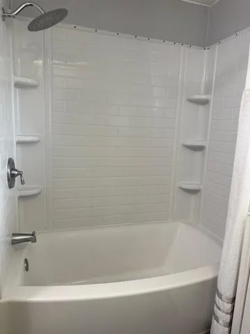 a bathroom with a sink a toilet and vanity