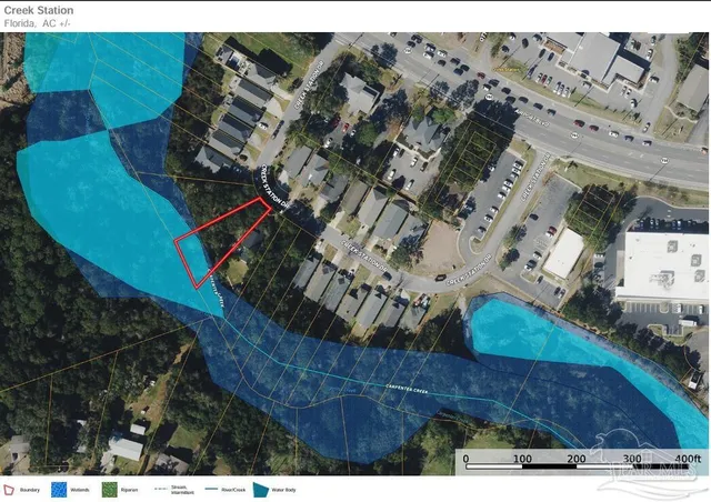 an aerial view of a house with a garden