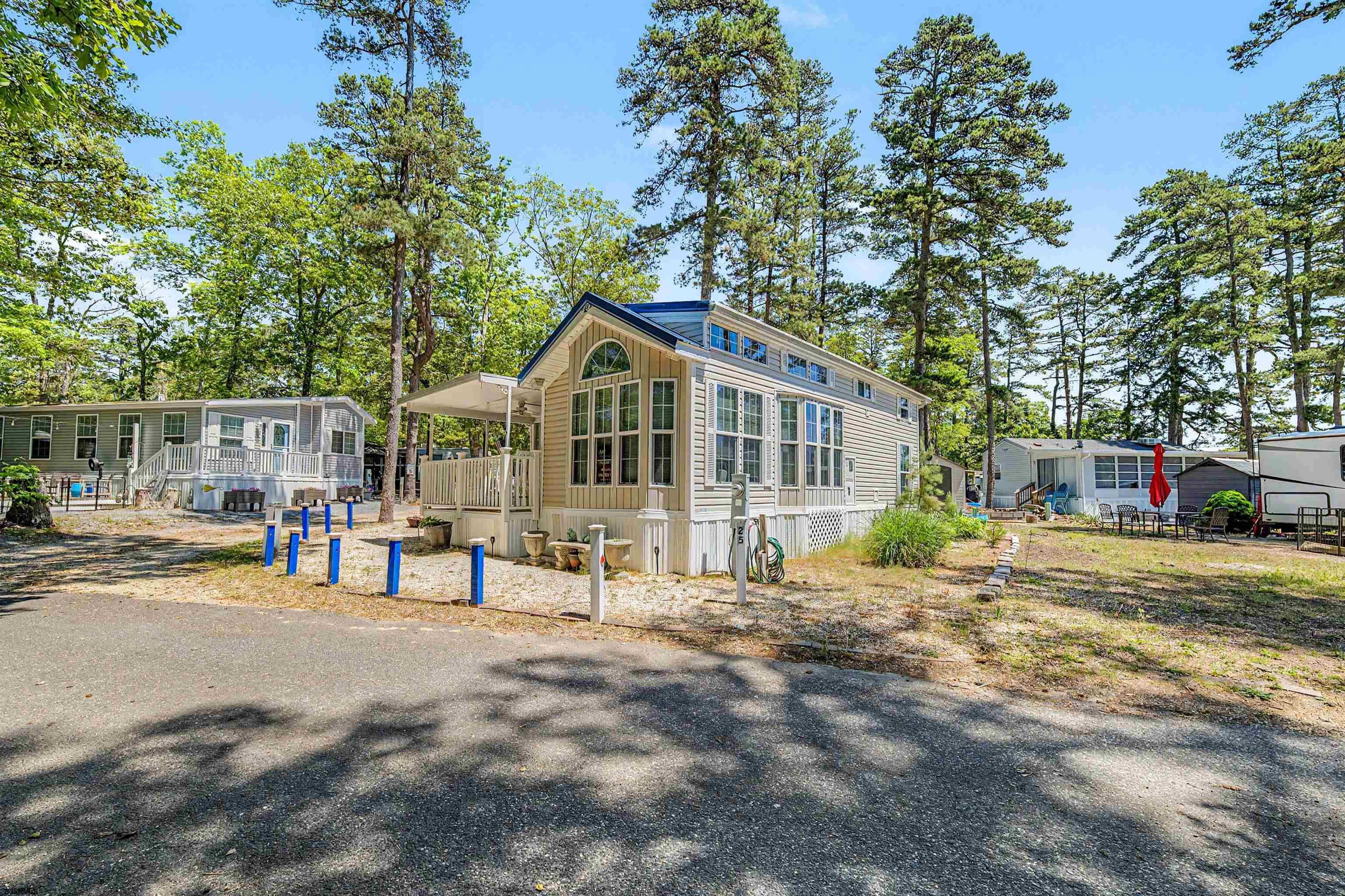 3066 Route 9 Ocean View, NJ 08230 - Photo 3 of 29 a view of a house with a yard and sitting area