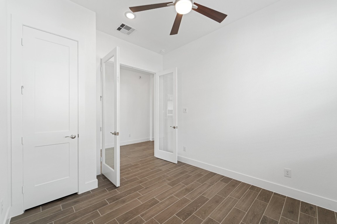 310 Blue River Trail Rosenberg, TX 77471 - Photo 13 of 47 a view of a hallway with wooden floor