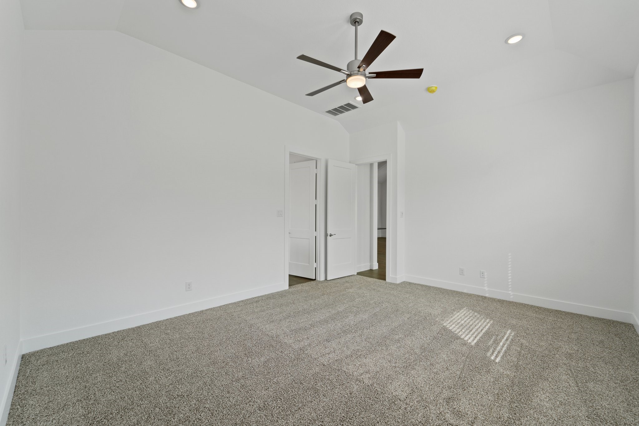 310 Blue River Trail Rosenberg, TX 77471 - Photo 21 of 47 a view of a big room with a ceiling fan
