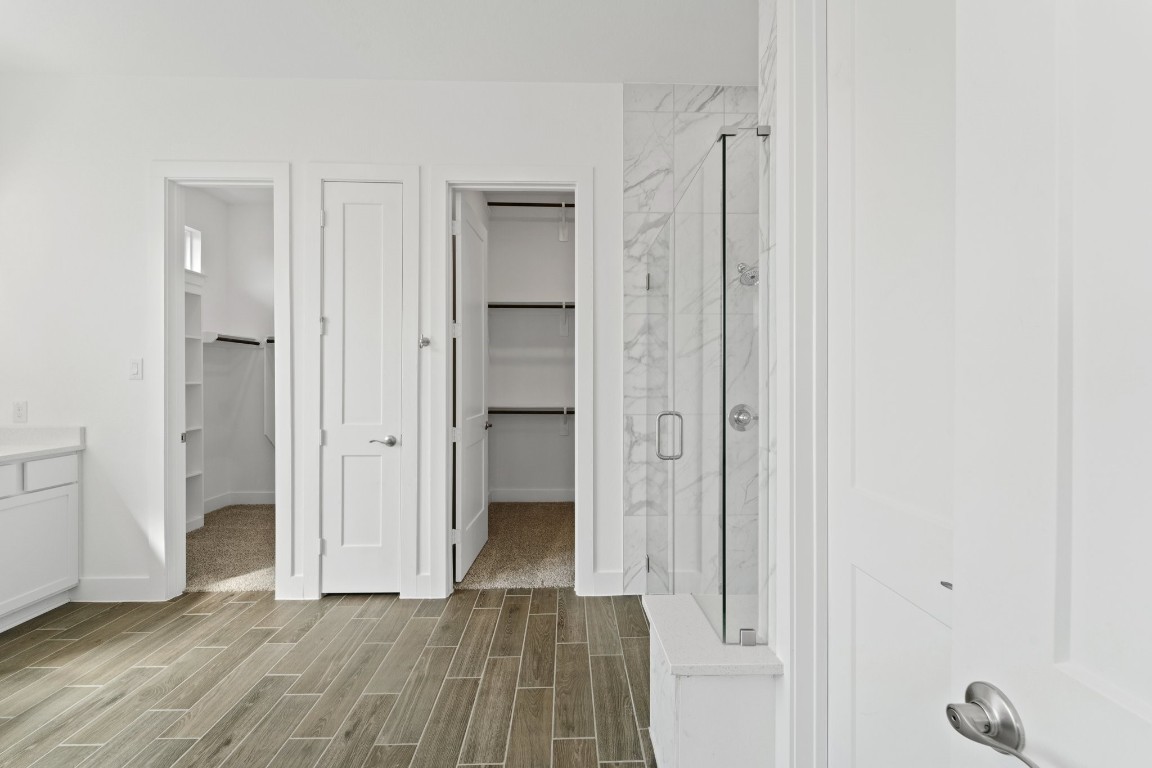 310 Blue River Trail Rosenberg, TX 77471 - Photo 22 of 47 a view of a bathroom with wooden floor