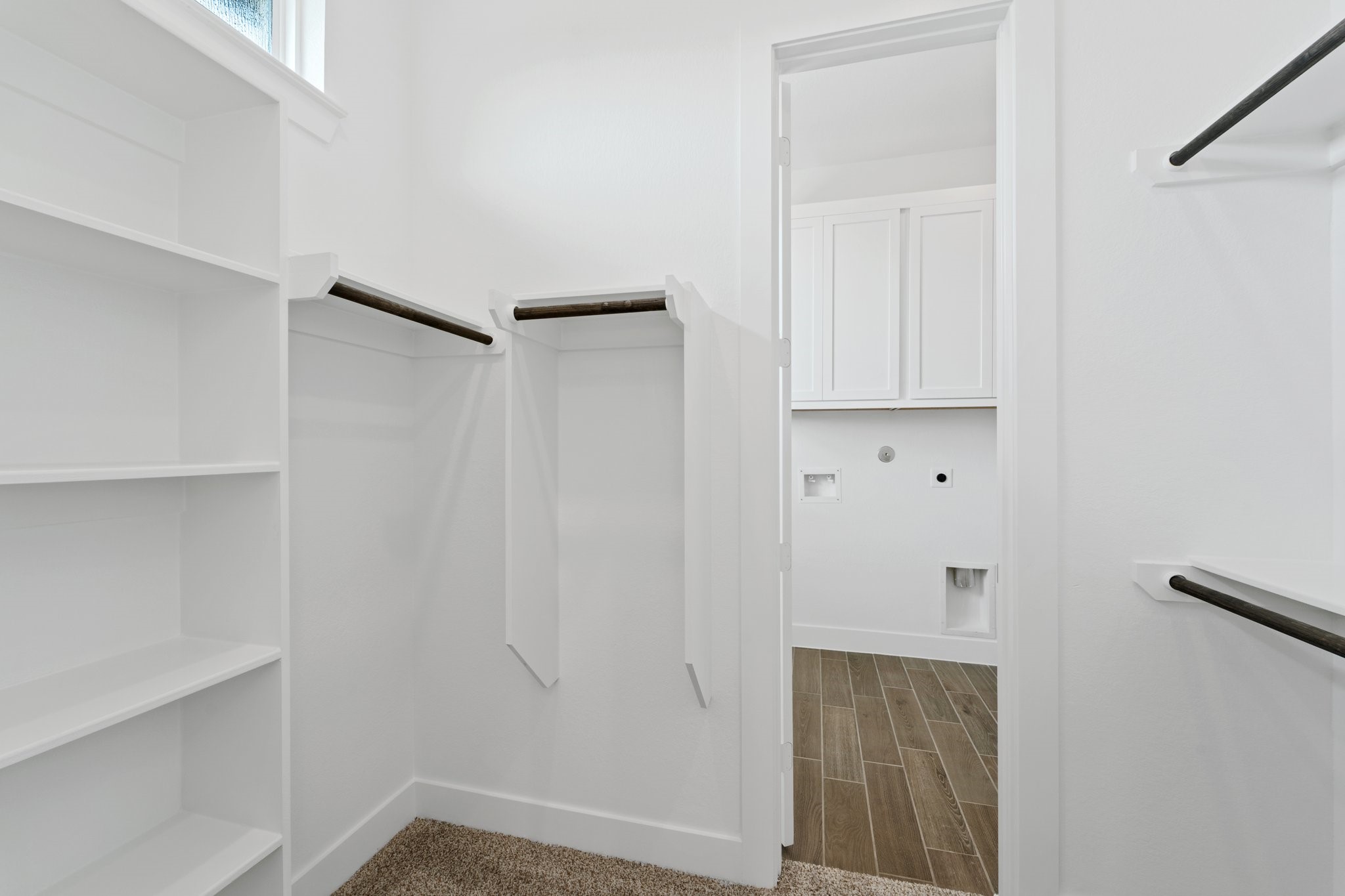 310 Blue River Trail Rosenberg, TX 77471 - Photo 27 of 47 a view of walk in closet with empty racks