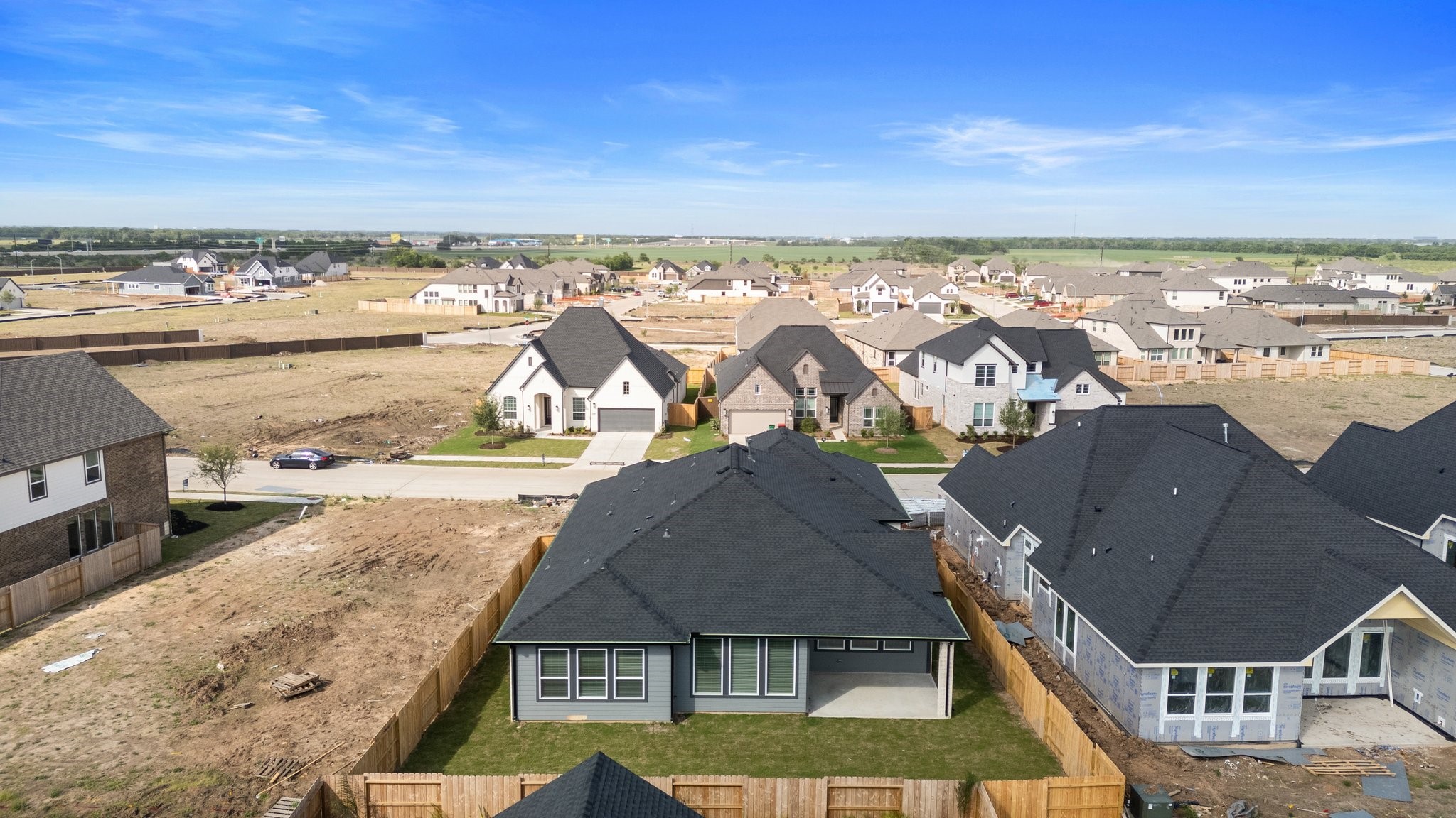 310 Blue River Trail Rosenberg, TX 77471 - Photo 33 of 47 an aerial view of residential houses with outdoor space