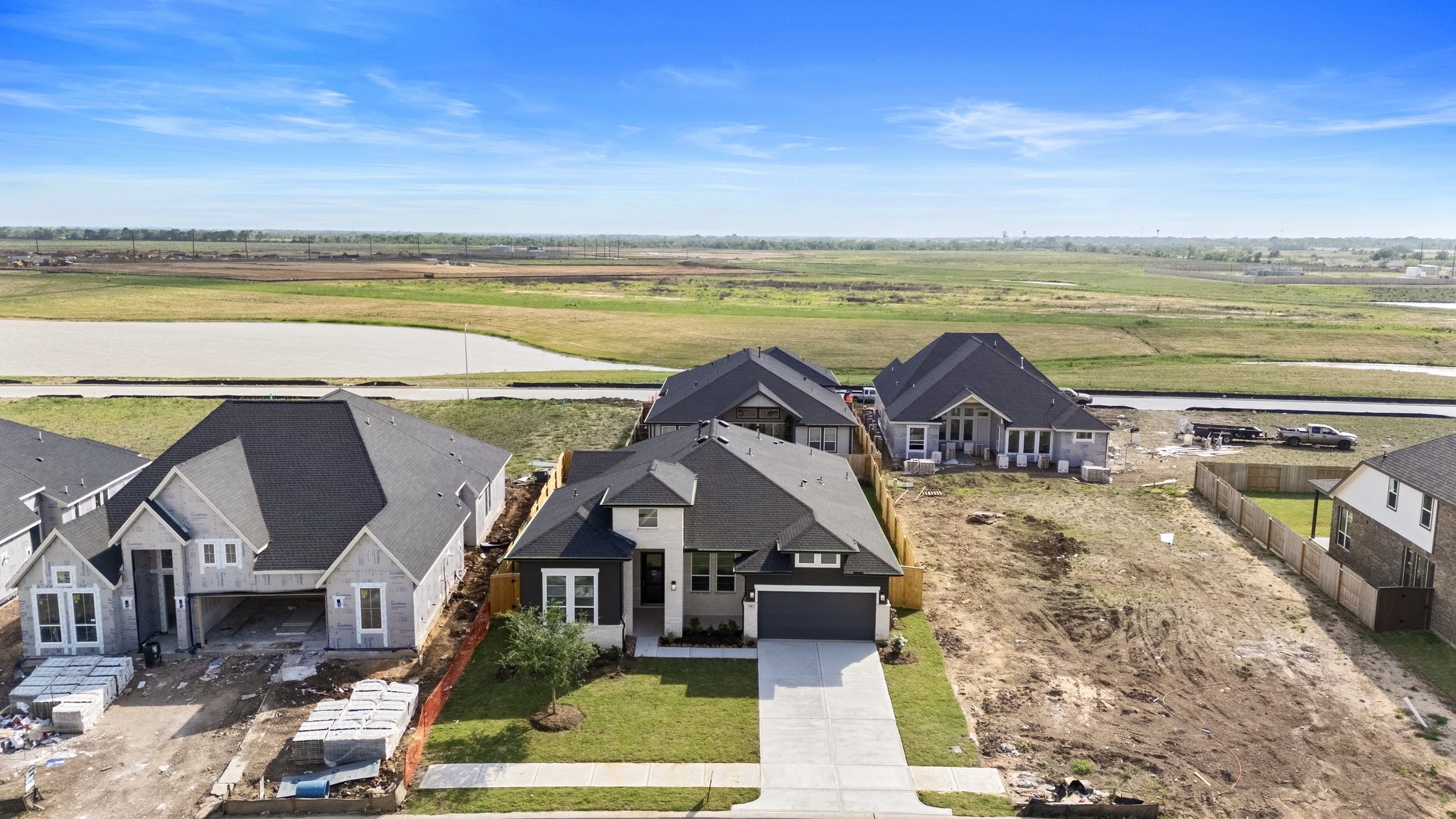 310 Blue River Trail Rosenberg, TX 77471 - Photo 34 of 47 a view of a swimming pool with an outdoor seating