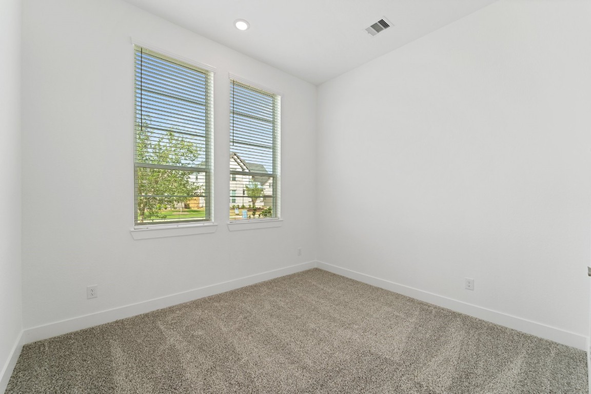 310 Blue River Trail Rosenberg, TX 77471 - Photo 4 of 47 an empty room with windows