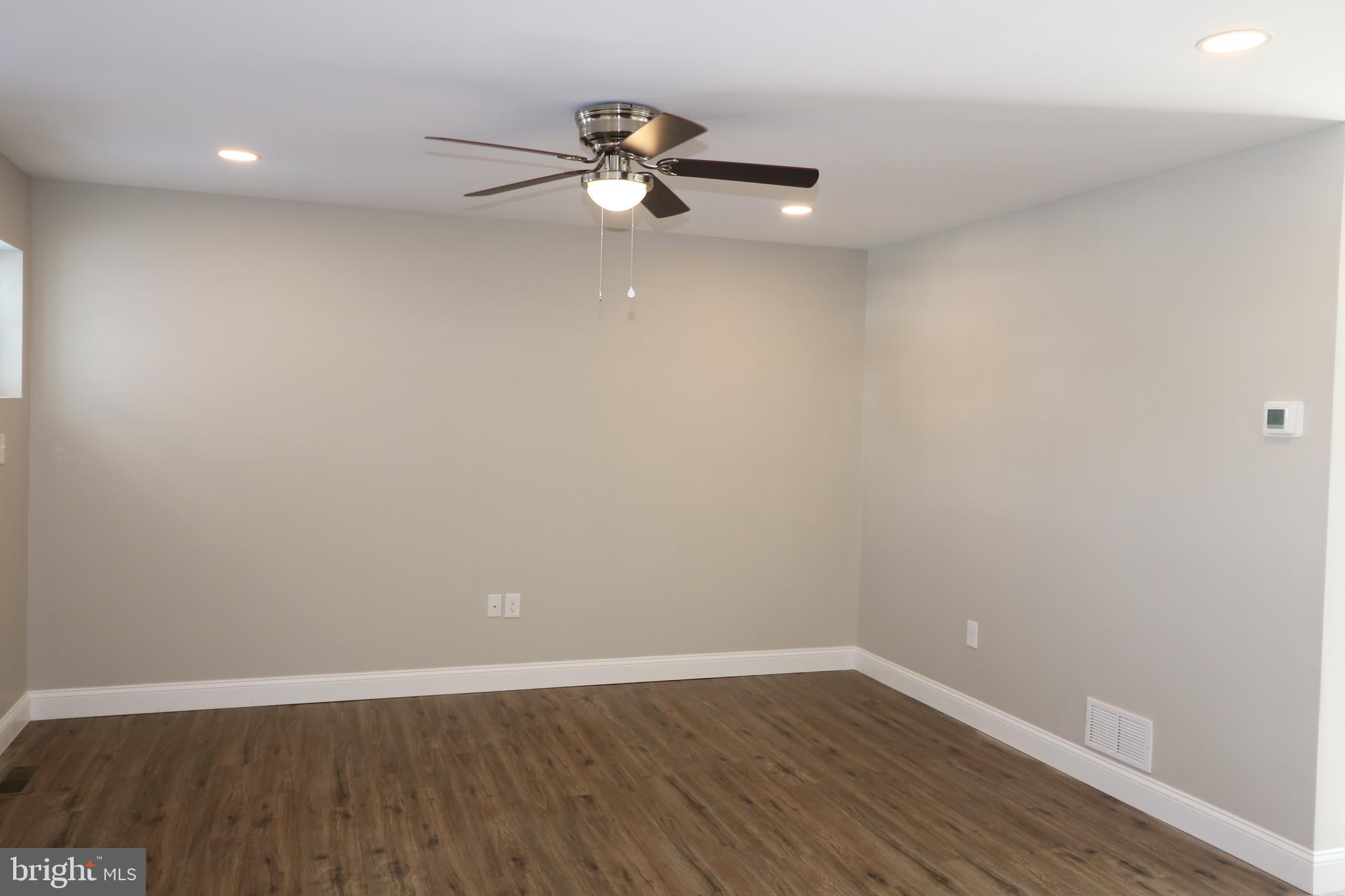 38 Rosalie's Way Temple, PA 19560 - Photo 3 of 15 a view of a room with wooden floor and white walls