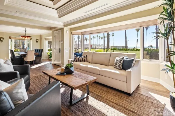 a kitchen with granite countertop a sink cabinets and window