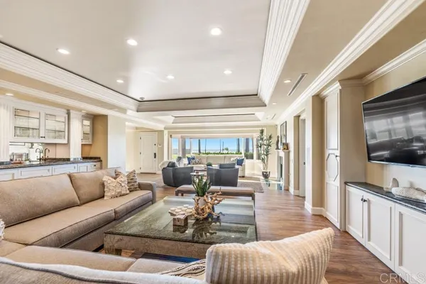 a kitchen with granite countertop a sink stove and cabinets
