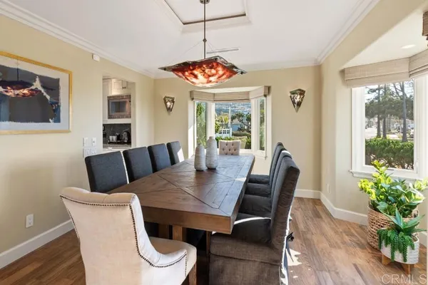 a large white bed in a white room