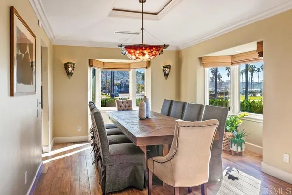 a kitchen with stainless steel appliances granite countertop a refrigerator and stove top oven