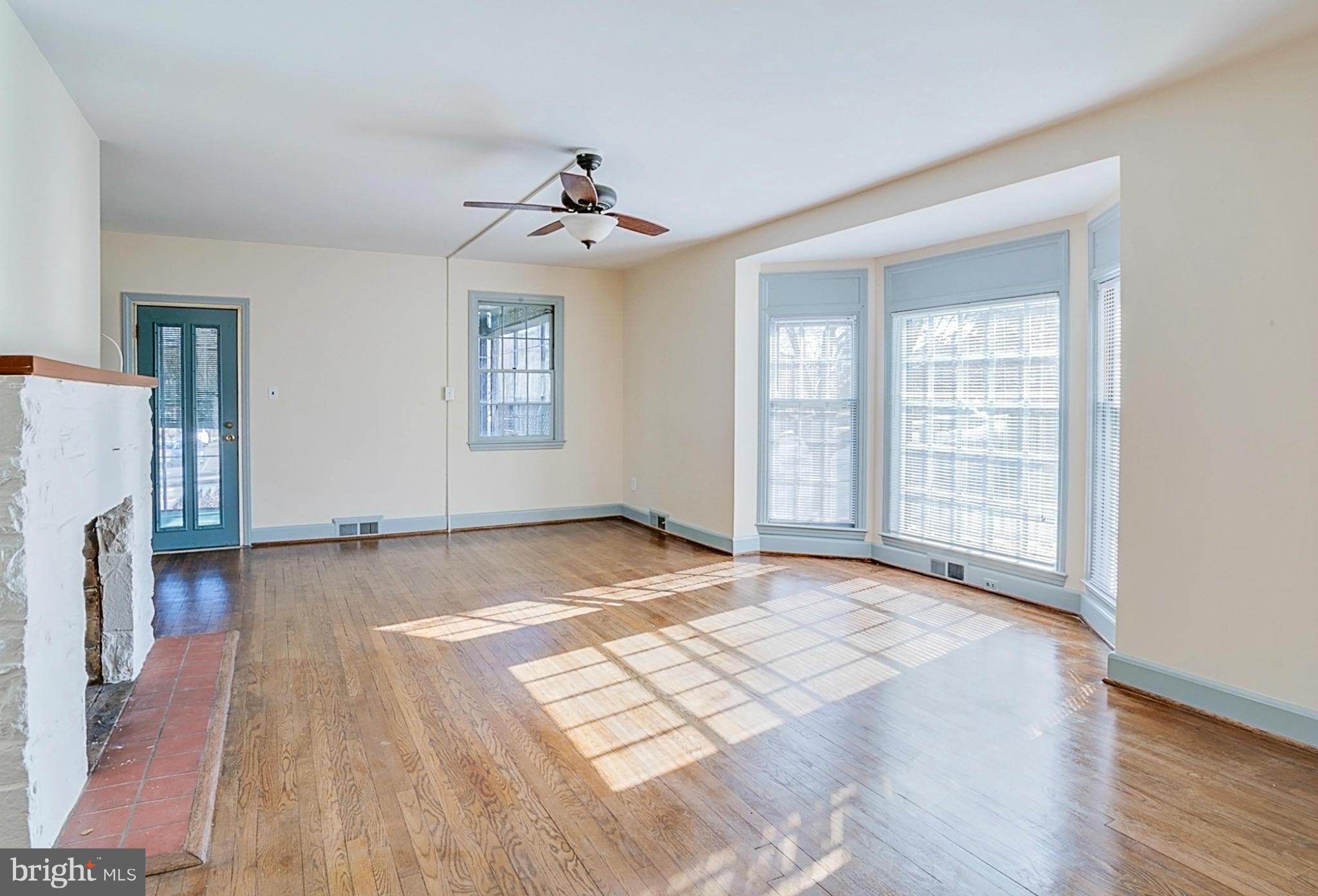 1 Dunmore Road Catonsville, MD 21228 - Photo 4 of 29 Main level living room with beautiful bay window