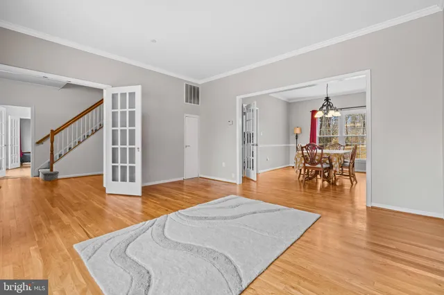 a living room with furniture or couch and a window