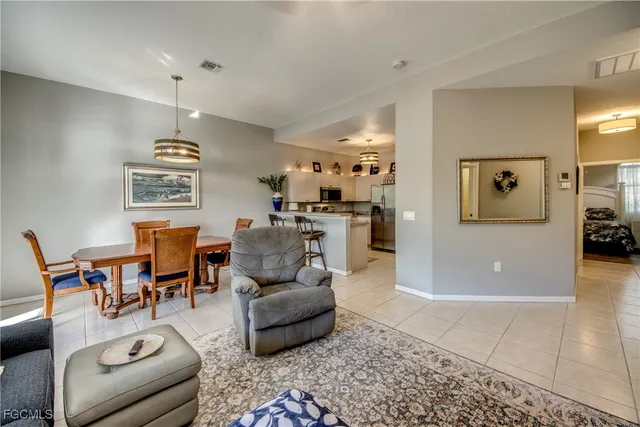 a kitchen with a sink stove and microwave