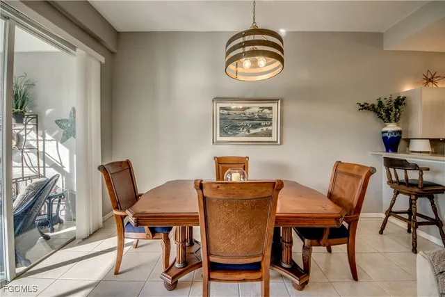 a view of a kitchen with a sink and microwave