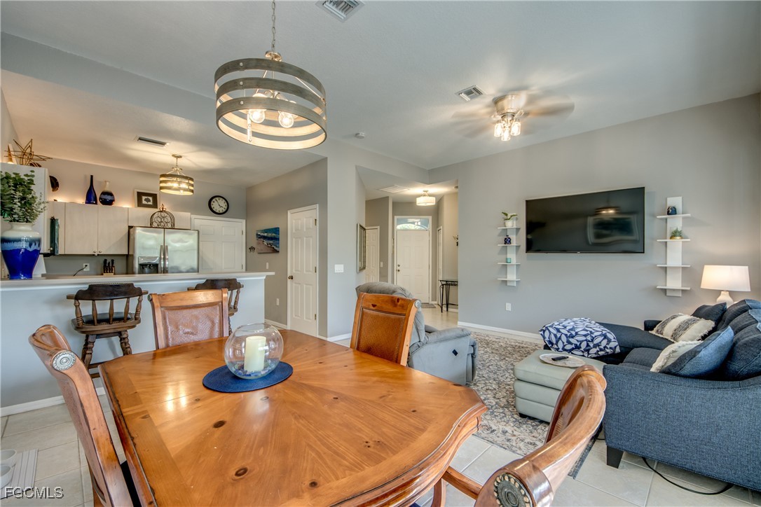 3181 Matecumbe Key Road, Unit 11 Punta Gorda, FL 33955 - Photo 24 of 50 a view of a dining room with furniture