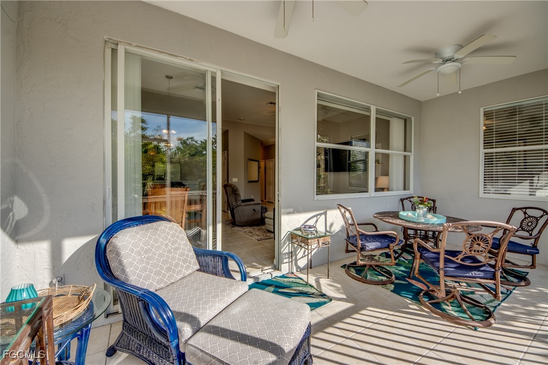 3181 Matecumbe Key Road, Unit 11 Punta Gorda, FL 33955 - Photo 43 of 50 a view of a dining room with furniture window and outside view