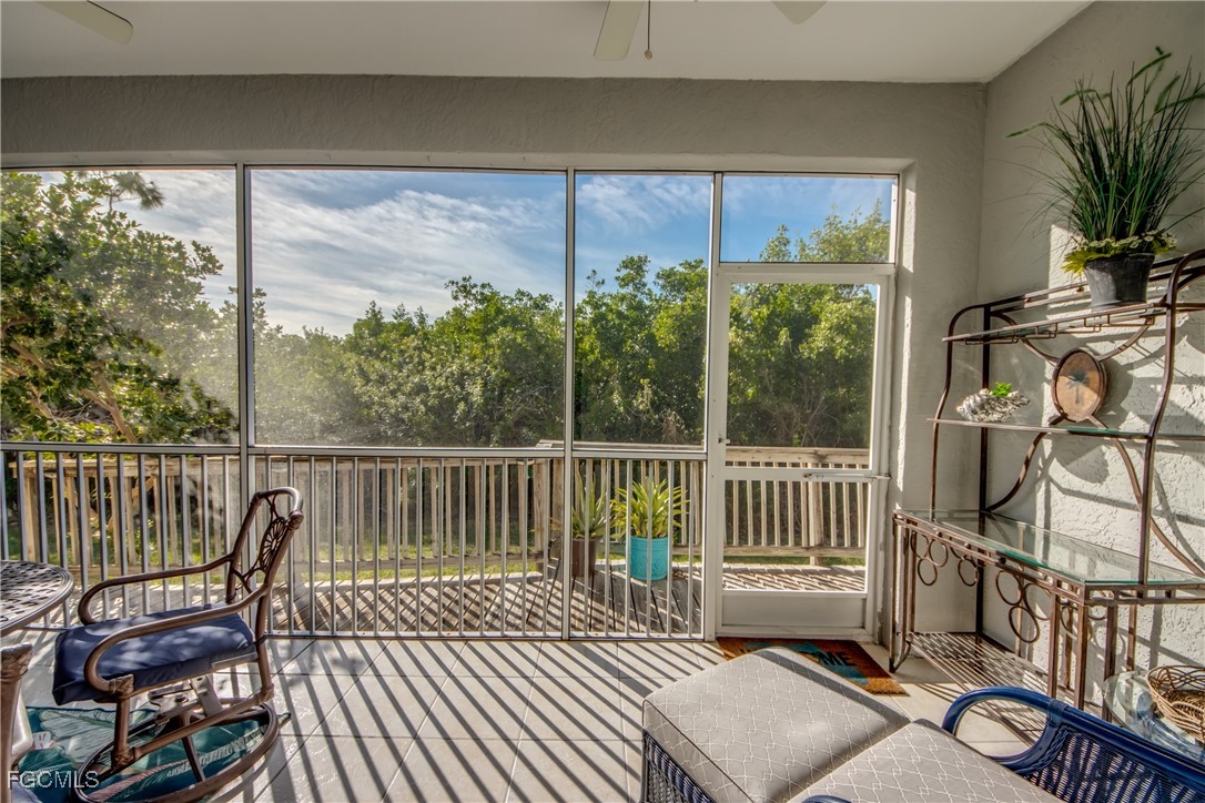 3181 Matecumbe Key Road, Unit 11 Punta Gorda, FL 33955 - Photo 45 of 50 a view of a balcony with chairs