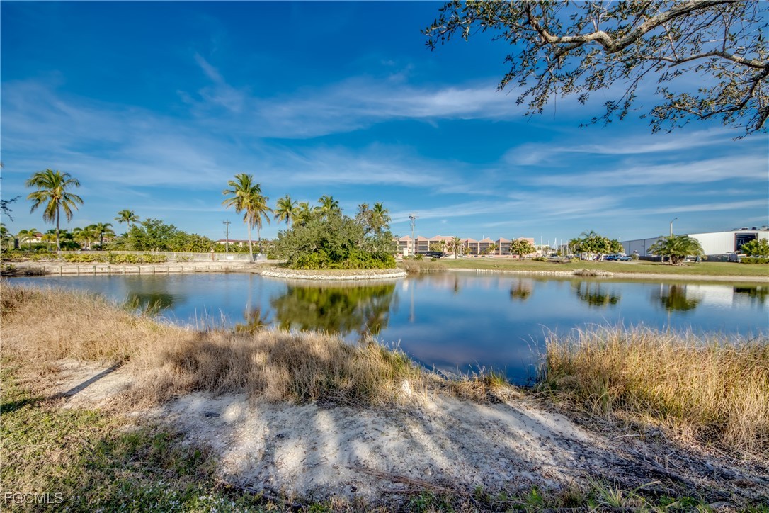 3181 Matecumbe Key Road, Unit 11 Punta Gorda, FL 33955 - Photo 50 of 50 a view of a lake with houses