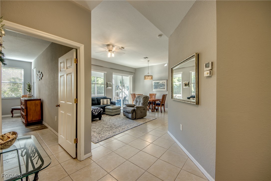 3181 Matecumbe Key Road, Unit 11 Punta Gorda, FL 33955 - Photo 9 of 50 a view of a livingroom and couch