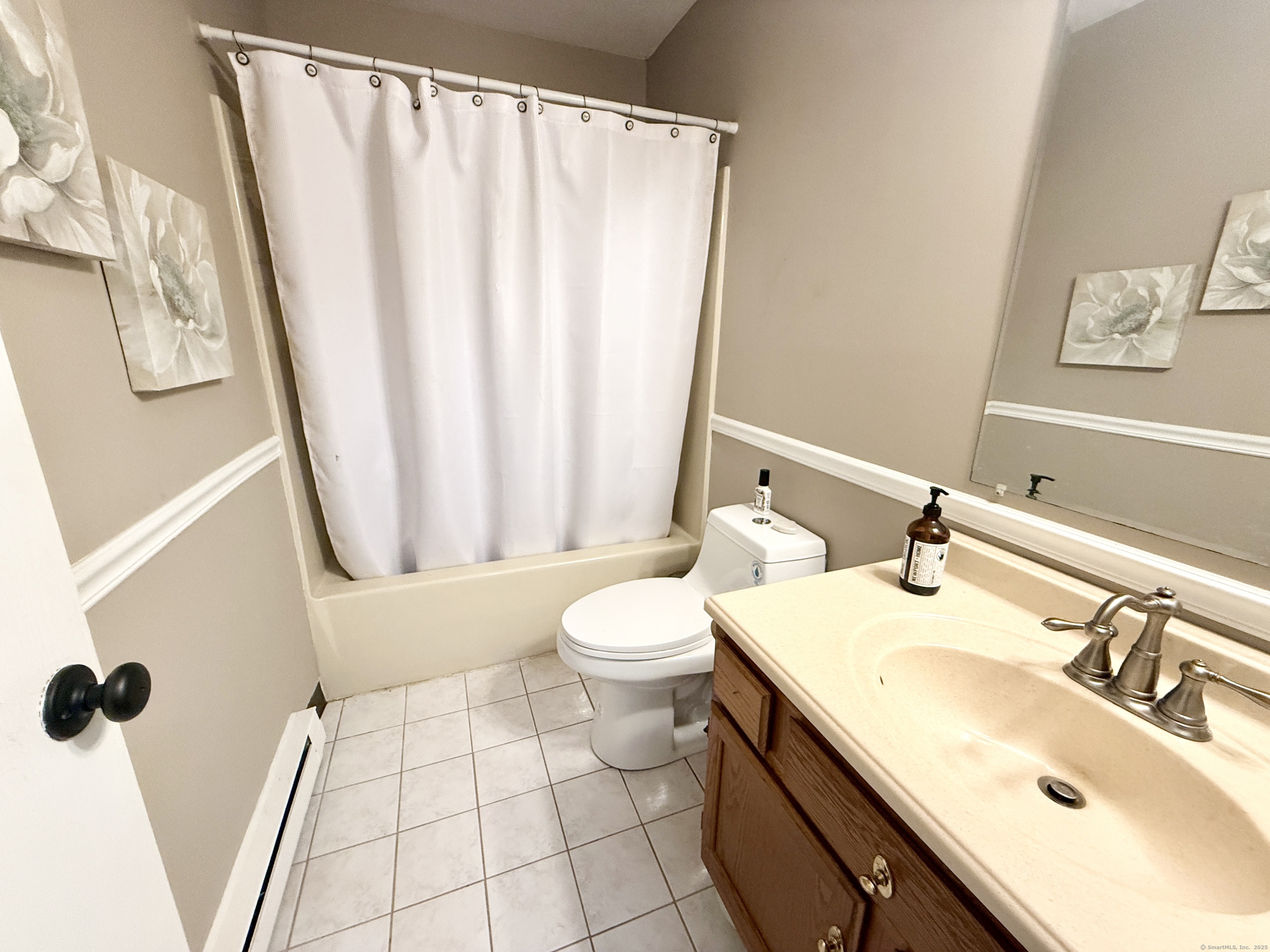 143 Pine Hill Road, Unit 15F Thomaston, CT 06787 - Photo 7 of 14 a bathroom with a sink toilet and shower