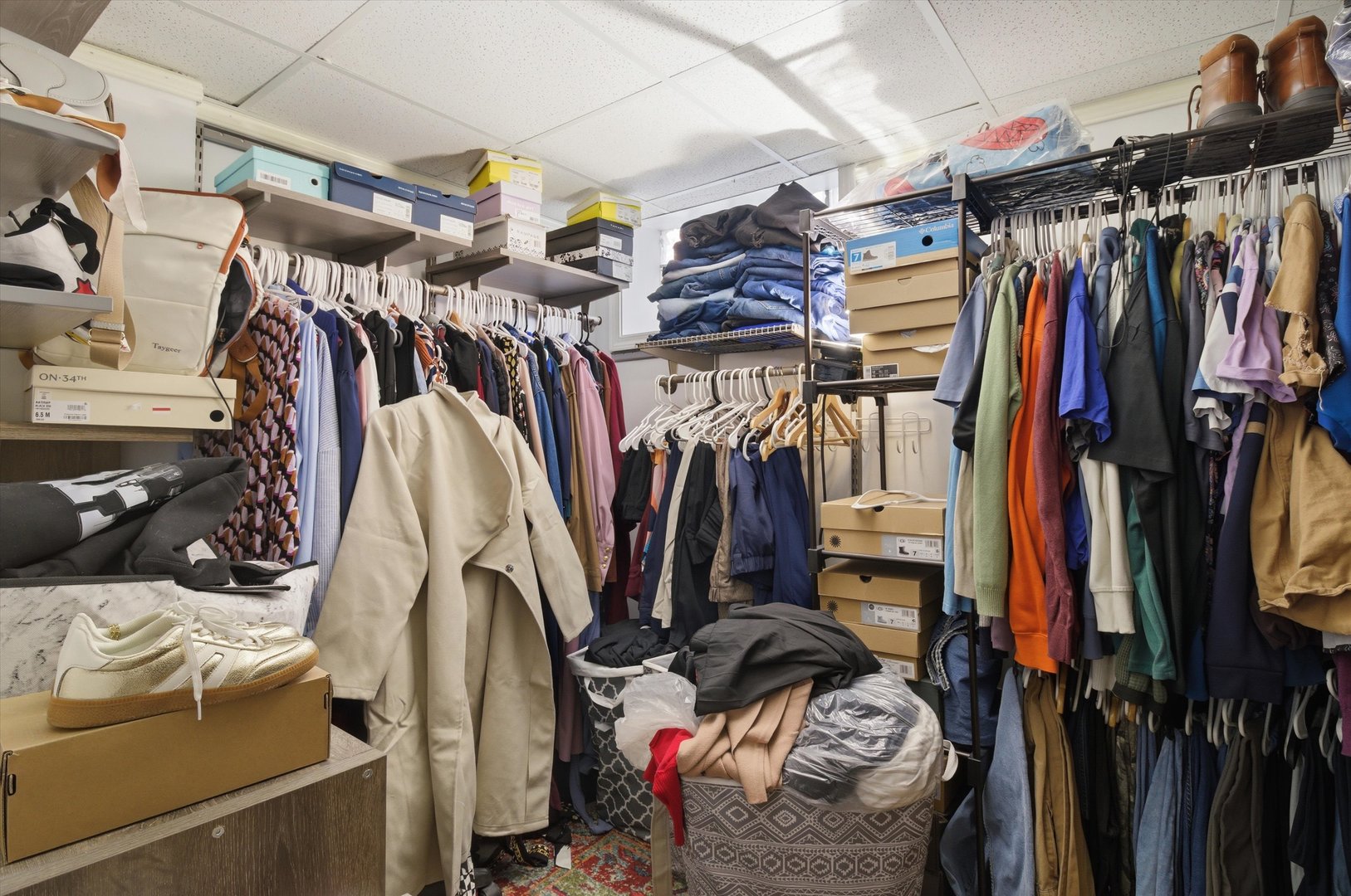 1107 West 101st Street Chicago, IL 60643 - Photo 18 of 28 a view of walk in closet with clothes