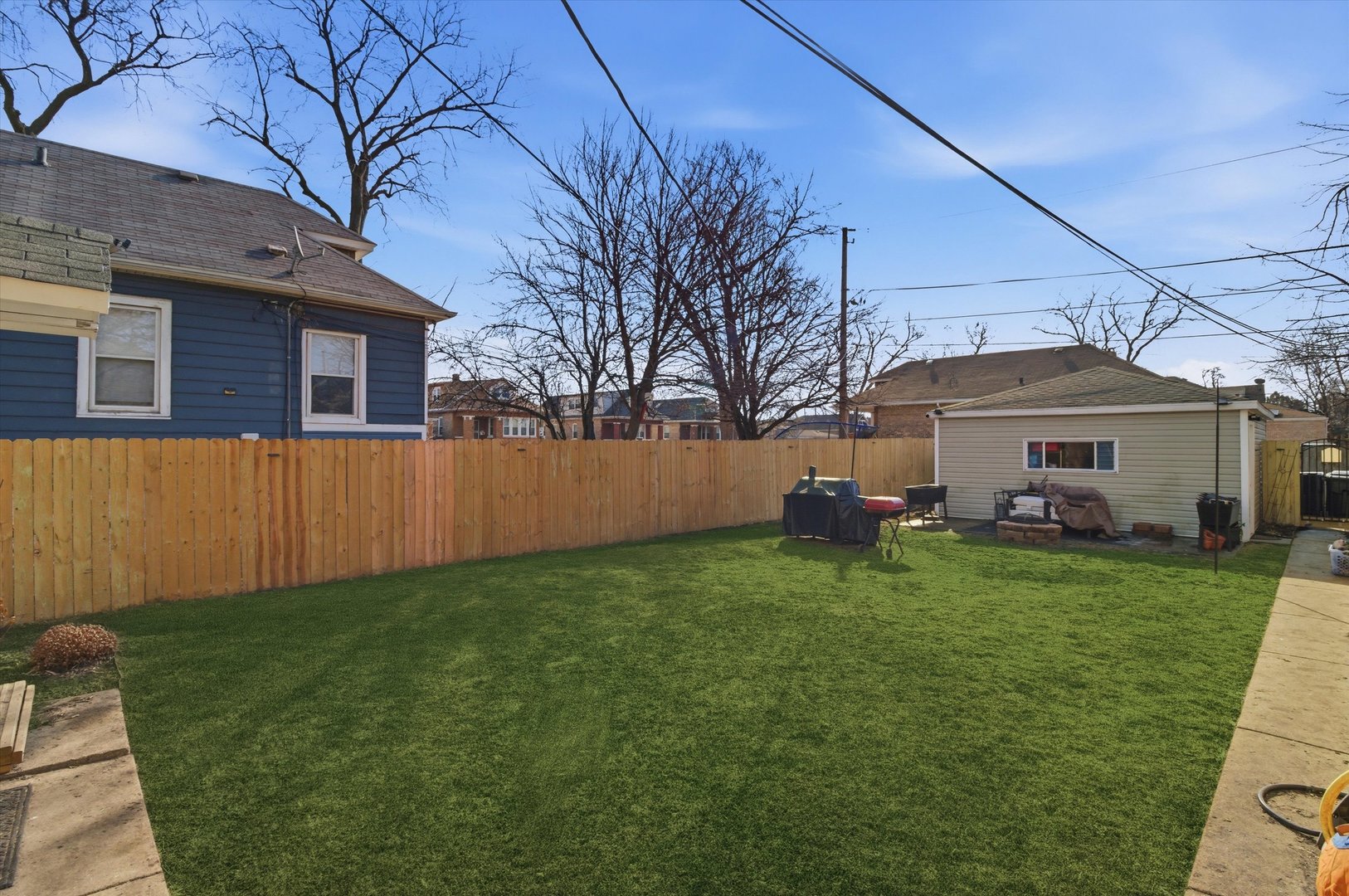 1107 West 101st Street Chicago, IL 60643 - Photo 26 of 28 a front view of house with yard and seating area