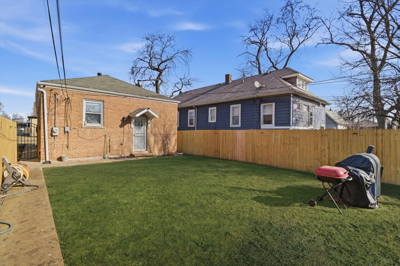 1107 West 101st Street Chicago, IL 60643 - Photo 27 of 28 a front view of a house with garden
