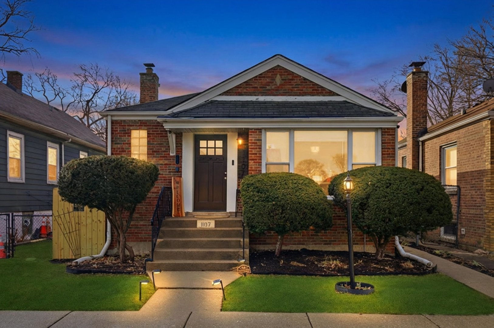 1107 West 101st Street Chicago, IL 60643 - Photo 28 of 28 a front view of a house with garden