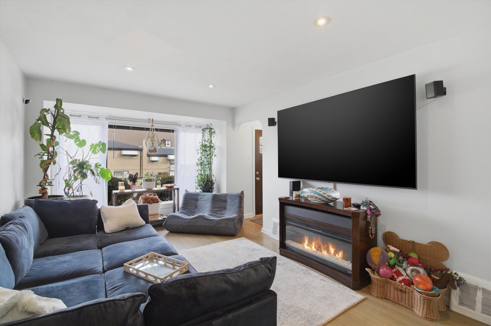 1107 West 101st Street Chicago, IL 60643 - Photo 6 of 28 a living room with furniture and a flat screen tv