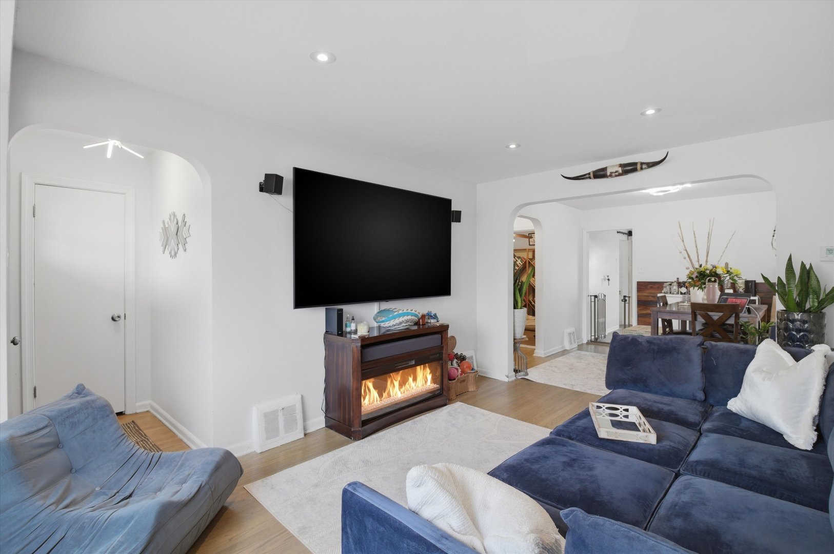 1107 West 101st Street Chicago, IL 60643 - Photo 7 of 28 a living room with furniture and a flat screen tv