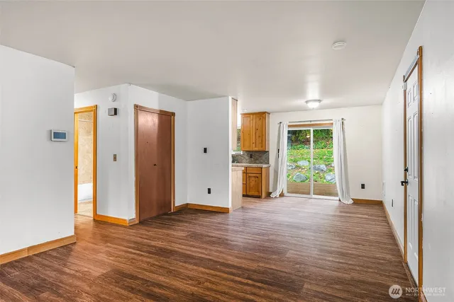 a view of a livingroom with wooden floor
