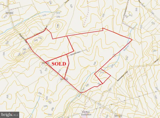 a sign with a white and a white door