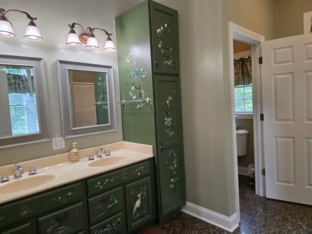 a room with furniture and a flat screen tv