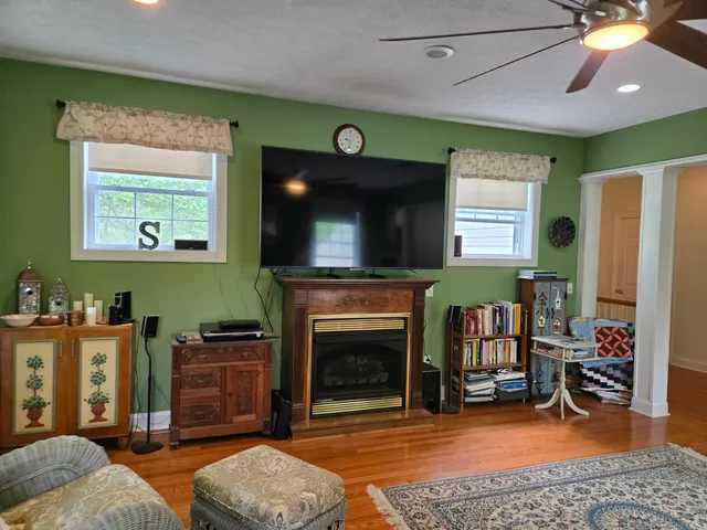 a view of a balcony with furniture