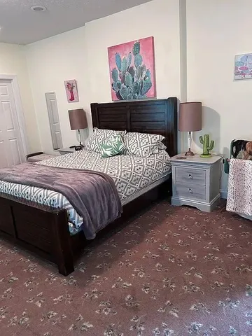 a view of a chair and table on the wooden floor