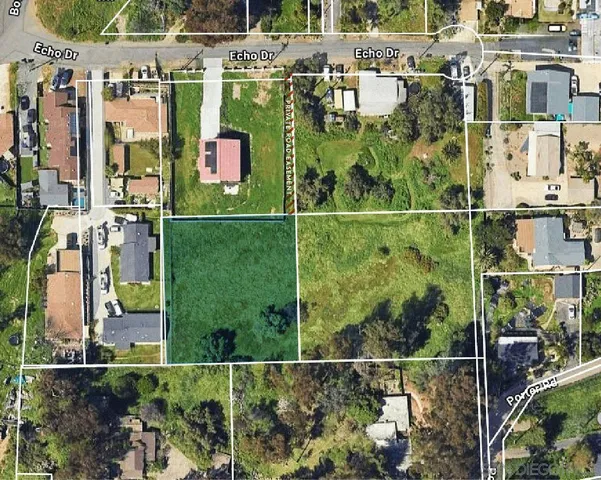 an aerial view of houses with outdoor space