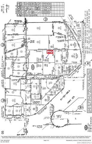 an aerial view of a house with a swimming pool