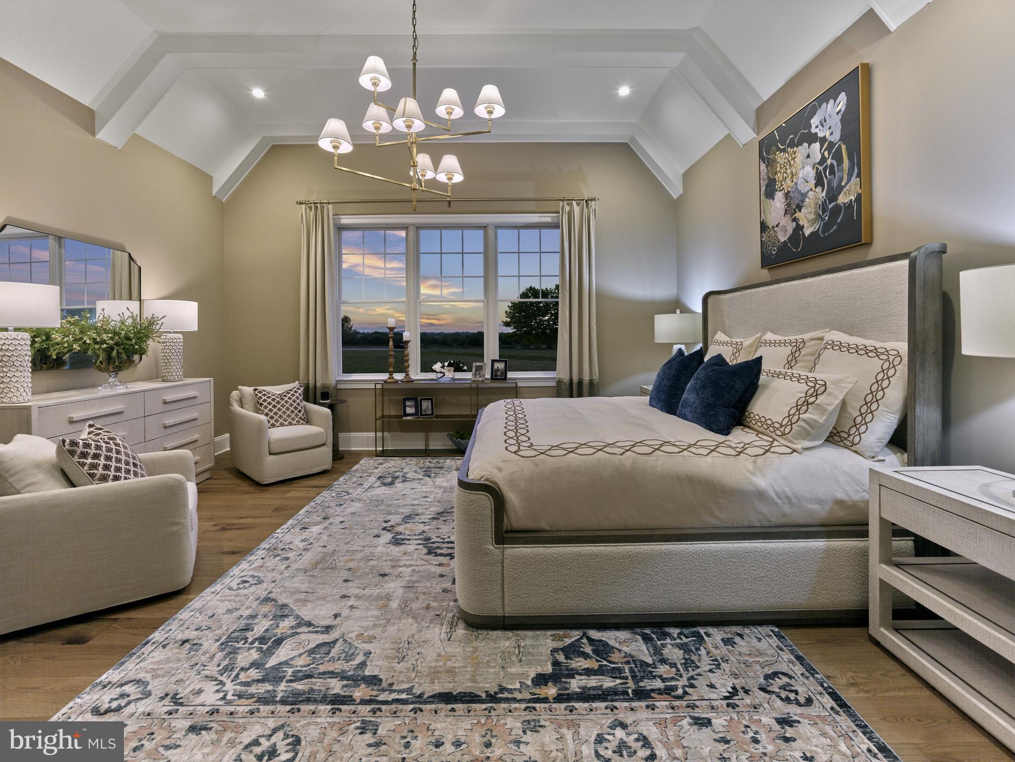 303 Walnut Avenue Wayne, PA 19087 - Photo 36 of 68 a bedroom with a large bed and a chandelier