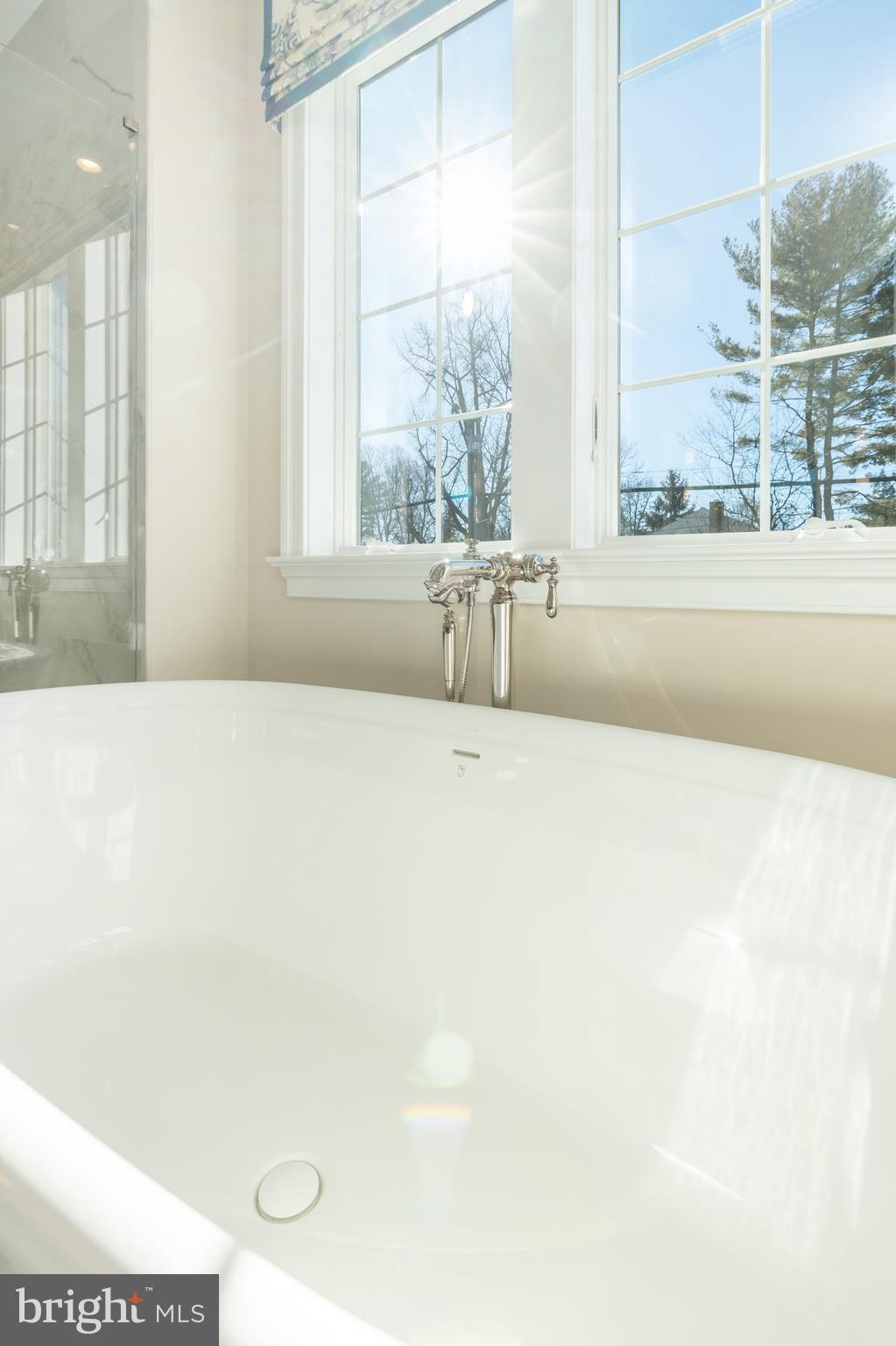 303 Walnut Avenue Wayne, PA 19087 - Photo 46 of 68 a bathroom with a tub sink and window