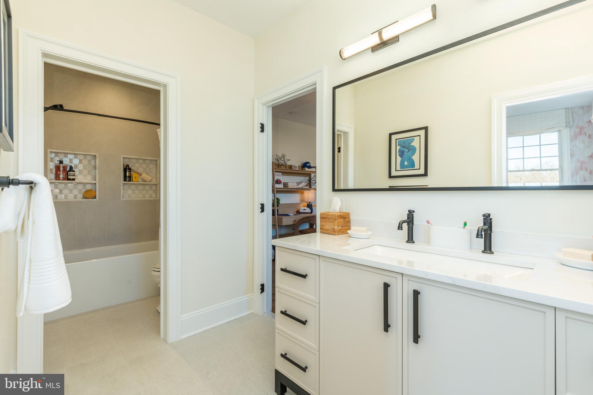 303 Walnut Avenue Wayne, PA 19087 - Photo 52 of 68 a bathroom with a sink a vanity and a mirror