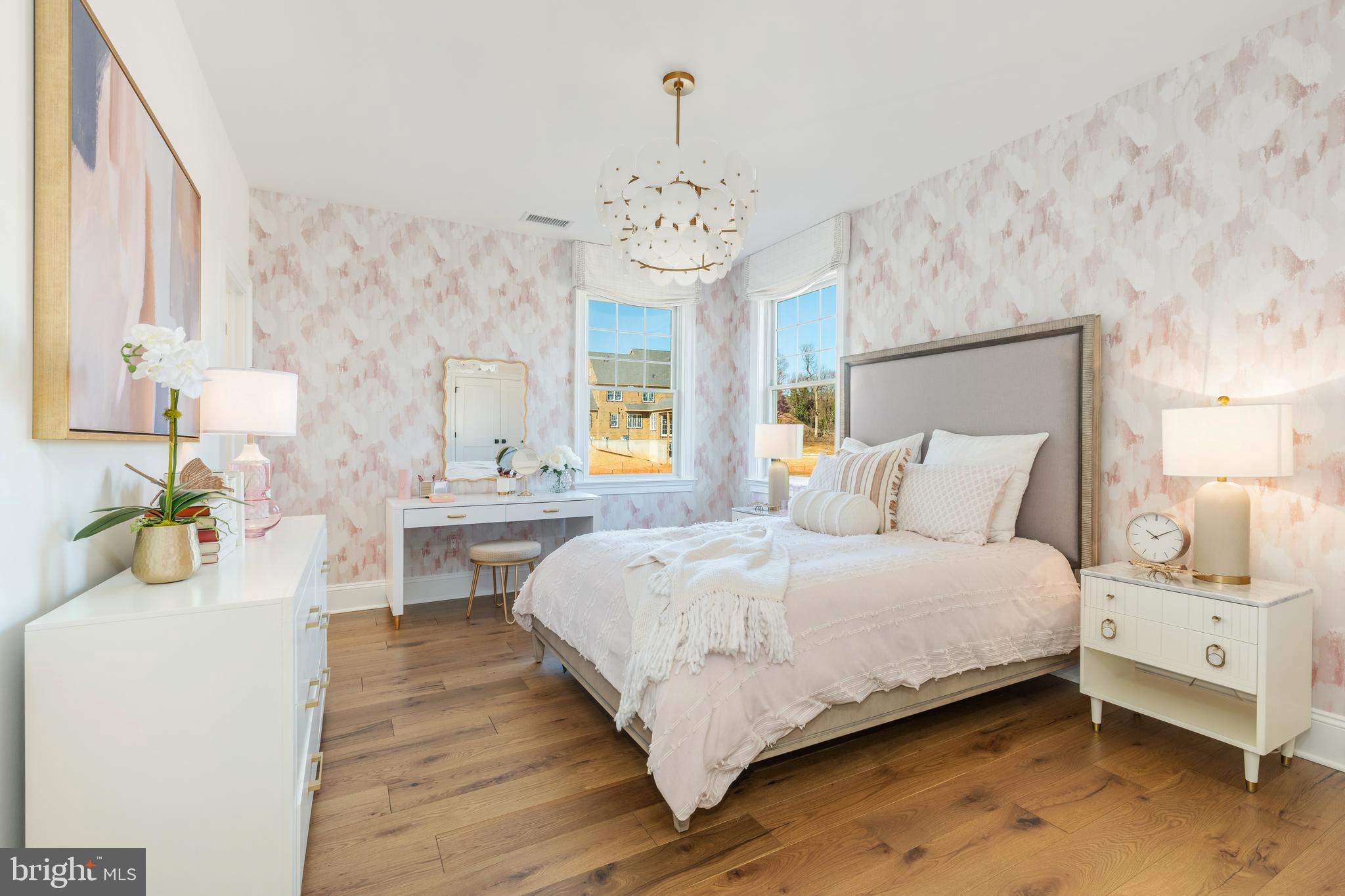 303 Walnut Avenue Wayne, PA 19087 - Photo 54 of 68 a bedroom with a bed and a chandelier