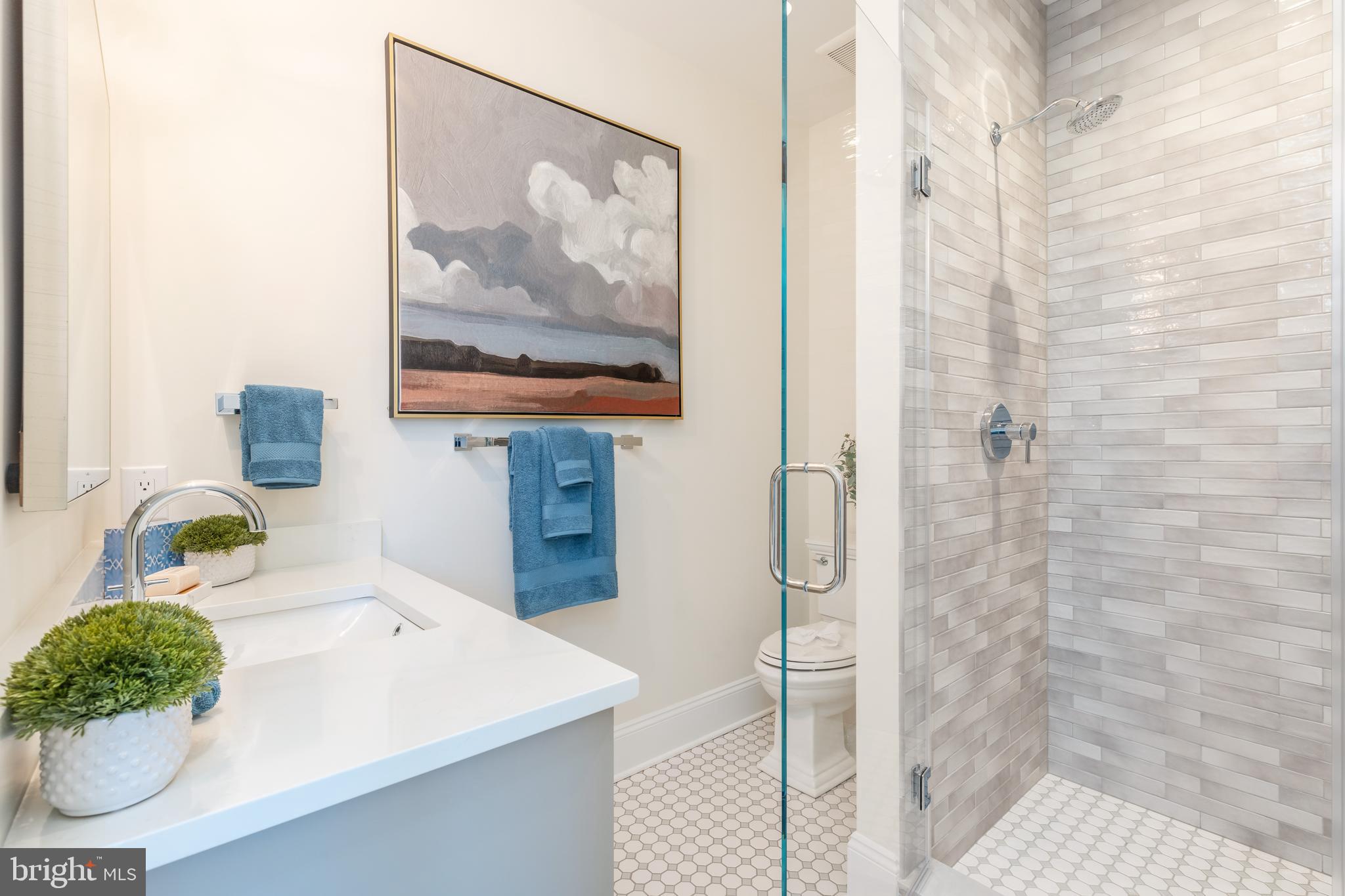 303 Walnut Avenue Wayne, PA 19087 - Photo 62 of 68 a bathroom with a sink and a mirror