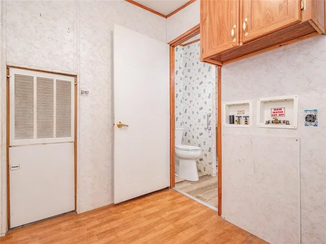 a view of bathroom with bathtub and shower