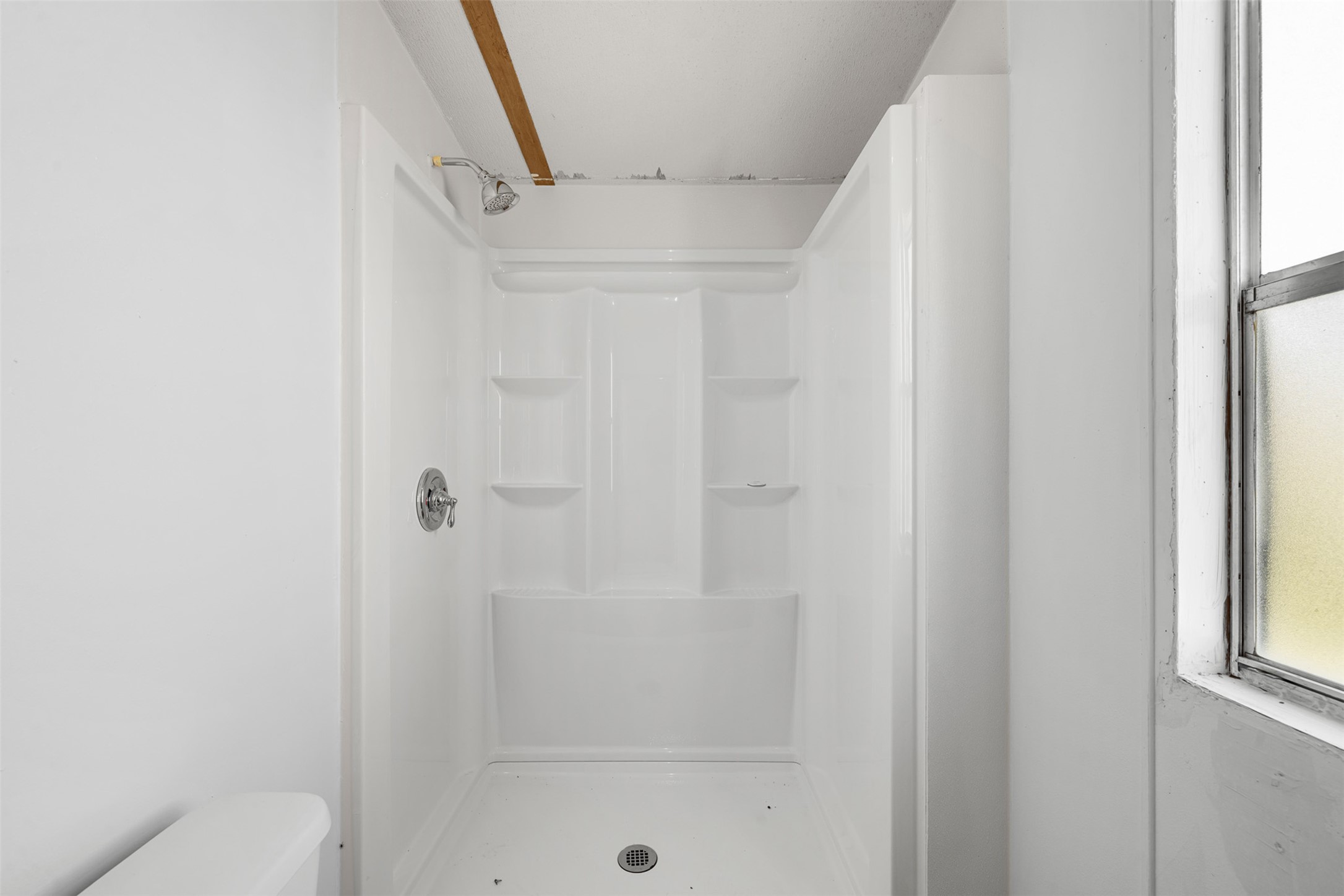 1919 County Road 344 Loop Milano, TX 76556 - Photo 14 of 21 a bathroom with a shower and a toilet