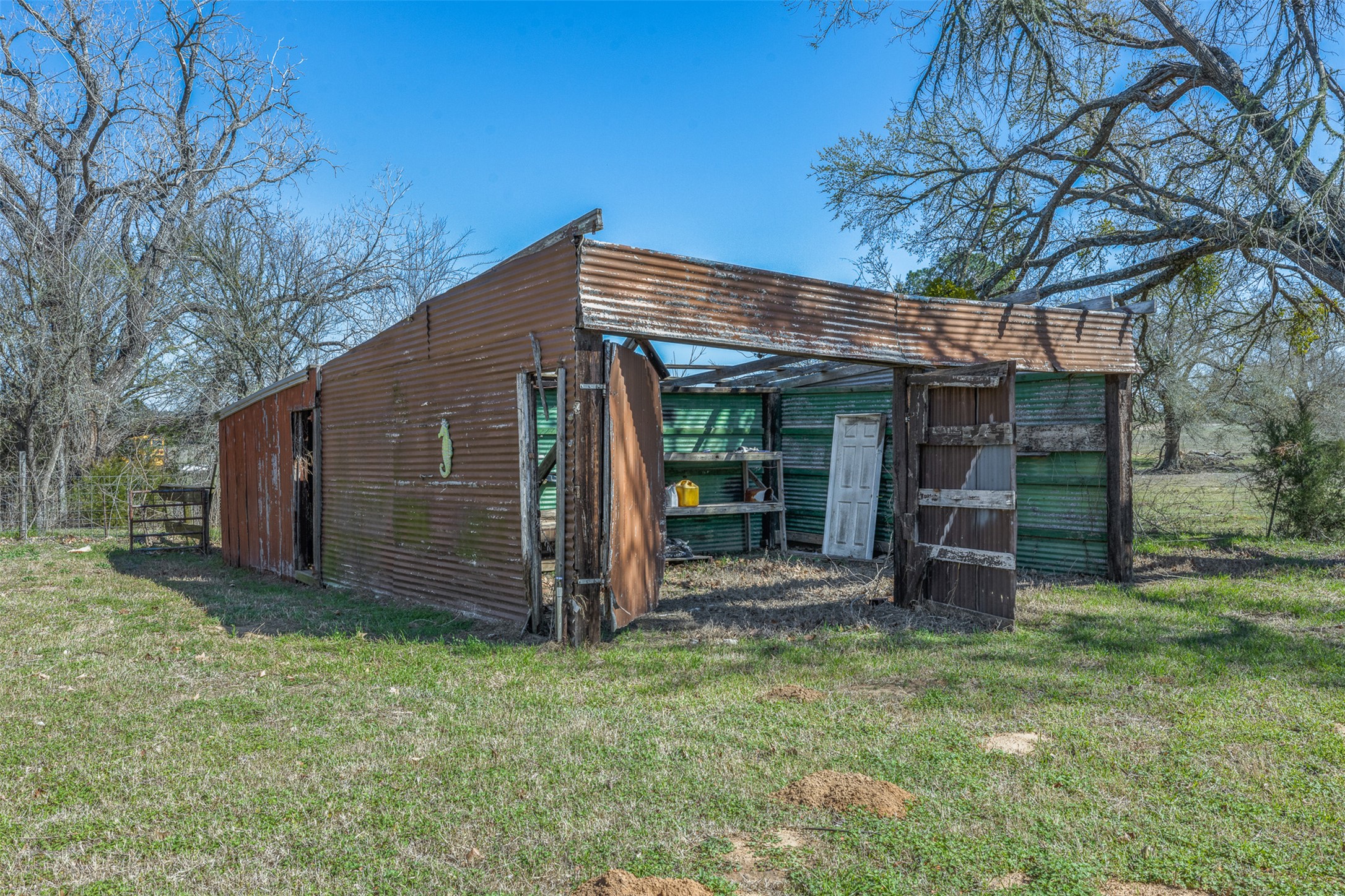 1919 County Road 344 Loop Milano, TX 76556 - Photo 20 of 21 a view of a house with a backyard