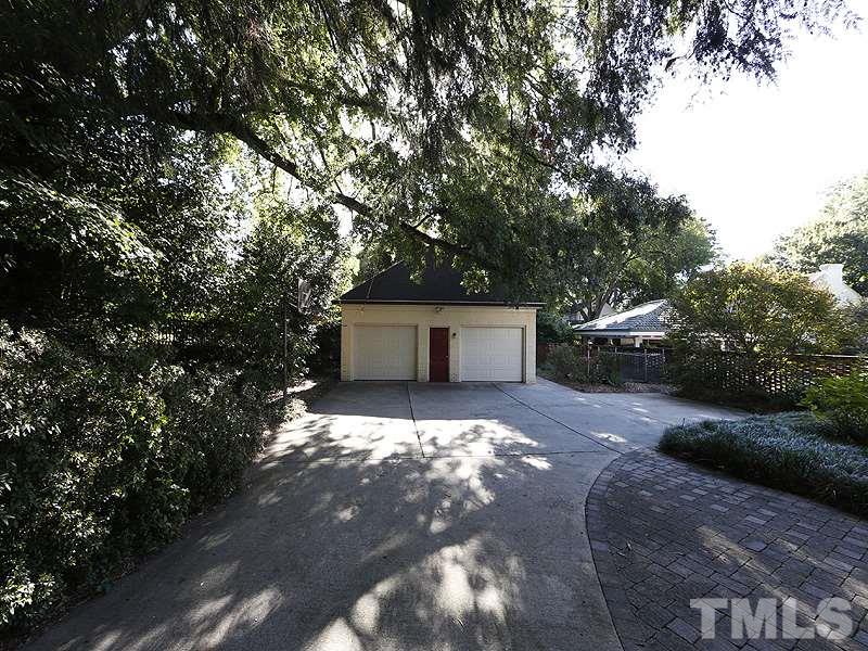 1804 St Marys Street Raleigh, NC 27608 - Photo 23 of 25 a view of a house with a yard and large tree